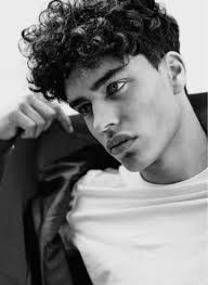 The hair is cut and framed to shape his face, especially since it is layered along his foreheads so as to not cover his eyes. 15 Best Hairstyles For Teenage Guys With Curly Hair