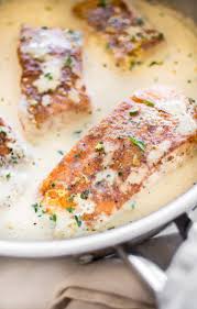 Tender Pan Seared Salmon In A Creamy Lemon Garlic Butter Sauce Is Easy Quick And Sure To Become A Family Fav Lemon Salmon Recipes Salmon Recipes Lemon Salmon