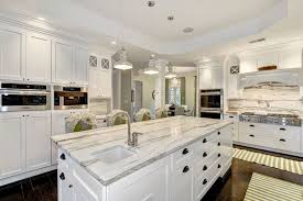 Hardwood floors in the kitchen pros and cons wood floor. Luxury Transitional Kitchen With White Cabinets Calacatta Marble Counter Espresso Oak Hardwood Floors And Metal Pendant Lights Designers Circle Hq