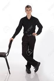 Standing with arms akimbo, that is with hands on hips for men, because of the flexible and protruding nature of the penis, it is simple to control the direction. Young Man Standing Next To The Chair On A White Background Stock Photo Picture And Royalty Free Image Image 26353969