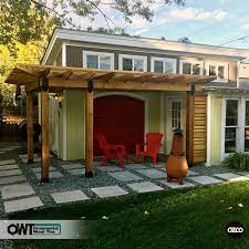 The vines wrap around the structure and create shadows for a gorgeous shaded walkway. Project Plans Corner Pergola Free Standing Attached