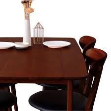 In smaller spaces, consider a round walnut dining table for four or six instead. Sunderland Solid Wood Walnut Dining Table Masons Home Decor