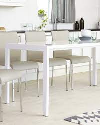 Interest free credit on orders over £500. White High Pressure Laminate Oval Extending White Dining Table Seats Up To 10 People Danetti