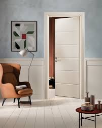 Porte in legno, porte in vetro, a battente, scorrevoli e blindate, parquet e pannelli in legno. Porte In Legno Massiccio Con Finiture A Tinte Rustiche Collezione Io Garofoli