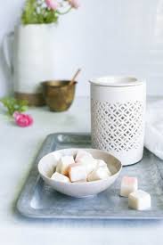 Essential oil candles make amazing homemade, inexpensive gifts. How To Make Your Own Soy Wax Melts Hello Nest