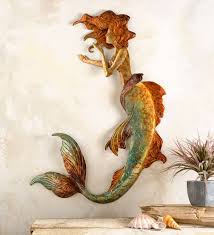 Frontgate orders may ship by standard ground service or truck delivery, and expedited shipping is available on many items. Handcrafted Metal Mermaid Wall Art Wind And Weather