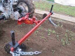 Homemade tractor hiller, naturally good farms waterville, maine, hiller attachment, raised garden beds, homemade hiller Mini Bedshaper Earth Tools