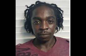 Shots' wanted for murder of court tout