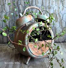 20 Creative Diy Planter Ideas Hative Recycled Planters Diy Planters Rusty Garden