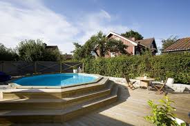 Wood Deck Round Above Ground Pool Buscar Con Google Pool Anlagga Pool Pooldack