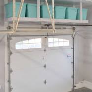 Everything else can go to the overhead storage rack where you do not have . Hanging Ceiling Diy Custom Overhead Garage Storage Rack Shelves Guideline House N Decor