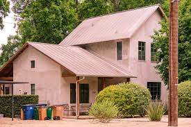 Metal roof insulation against energy loss/gain. Importance Of Installing Insulation Under Metal Roof Systems