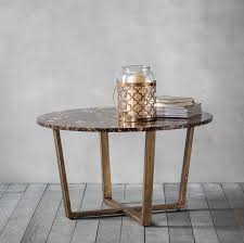 The table top is glossy black tempered glass. Hudson Living Emperor Round Marble Coffee Table Cfs Furniture Uk