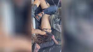 Palestinians Parading Young Israeli Girls Dead Body Through Street | theYNC