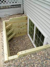 We install bilco stakwel egress window wells. How Much Does An Egress Window Cost Installation Basement Apartment Basement Remodeling Basement Windows