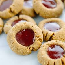 This Flourless Peanut Butter And Jelly Thumbprint Cookies Recipe Is Super Easy To Make Ju In 2020 Thumbprint Cookies Recipe Cookie Recipes Peanut Butter Jelly Cookies