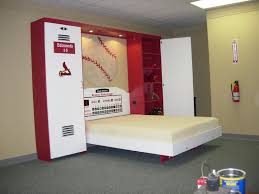 Hamptons inspired luxury kids boys bedroom before and after san. A Bed That Looks Like A Locker Room Talk About Creative This Would Be An Awesome Bedroom For Any Chiefs F Boys Room Design Kids Sports Room Kids Room Shelves