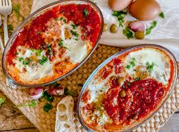 Baked Spanish Eggs With Tomatoes Olives Recipe Spain On A Fork Recipe Spanish Eggs Olive Recipes Delicious Breakfast Casserole