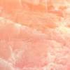 It has a pinkish white base and along with swirls of pink and green colors. 1