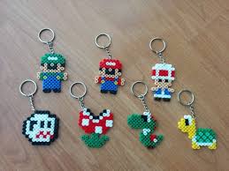 Super Mario Bros Key Rings Hama Perler Beads Free Uk Delivery Anniversaire Super Mario Anniversaire Mario Bros Anniversaire