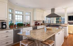 Kitchen With White Cabinets And Giallo Ornamental Granite Countertops White Shaker Kitchen Cabinets Antique White Kitchen White Granite Countertops