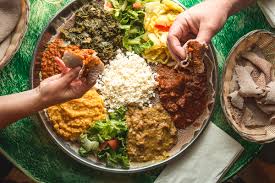 The ethiopian national dish is called wat. Cafe Desta Brings Communities Together Over Ethiopian Cuisine