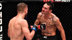 He currently competes in the featherweight division for the ultimate fighting championship (ufc). Max Holloway Defeats Calvin Kattar In One Sided Ufc Main Event