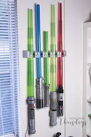 Max S Star Wars Bedroom Update Lightsaber Wall Storage Solution Star Wars Kids Bedroom Star Wars Kids Room Star Wars Bedroom