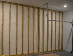 Assemble the wall on the ground. How To Frame Garage Walls Over Concrete Diy Guide With Photos Garage Transformed