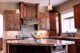 Dark earth tones on the floor allow you to choose a variety of colors for your cabinets in lighter shades. Dark Stained Hickory Cabinets Image Dark Stained Kitchen Cabinets Dark Hickory Image Kitchen Staine In 2020 Rustikale Kuchenschranke Kuchen Rustikal Kuchenumbau
