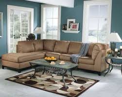 Teal Wall With Our Brown Couch Blue Living Room Brown And Blue Living Room Paint Colors For Living Room