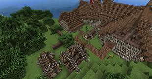 A sawmill with a resin funnel installed produces a fluid byproduct when processing wood. Minecraft Lumber Yard Drone Fest
