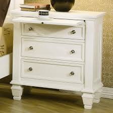 Use the sturdy profiled top to pile on your books, cell phone, alarm clock, lamp and whatever else you like: Coaster Sandy Beach Night Stand With 3 Drawers A1 Furniture Mattress Nightstands