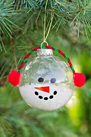 So if you can find some small stockings at your local dollar store, you know what to do! Christmas Snowman Ornament Craft Made With Clear Glass Balls We Love This Simple Craft Ide Diy Christmas Snowman Christmas Crafts Diy Christmas Tree Ornaments