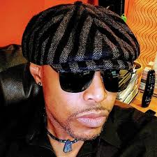 Jim Irsay and Renée Michelle Merrifield getting ready for their live  performance at the Guitar Magazine's 400th issue photo shoot. Jim is  holding George Harrison's 1964 Gibson SG, featured