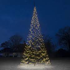 holiday favorites at flagco to light up and celebrate the occasion flagco christmas tree lighting tree lighting christmas tree silhouette