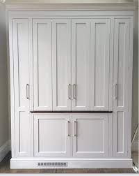 A refrigerator (colloquially fridge) is a home appliance consisting of a thermally insulated compartment and a heat pump (mechanical, electronic or chemical) that transfers heat from its inside to its external environment so that its inside is cooled to a temperature below the room temperature. Inglish Design On Twitter The Perfect Kitchen Cabinet For Entertaining Storage Power Integrated Fridge Bin A Drinks Cabinet A Place To Charge Phones A Breakfast Cabinet And Somewhere For Homework Books