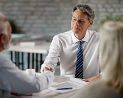 personal injury lawyer meeting with client office photo, AI generated