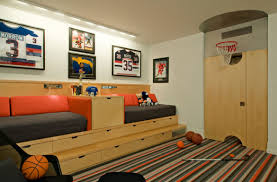 If the bedroom is shared and both kids love different sports, consider incorporating two different themes. Boys Sports Room Decor Novocom Top