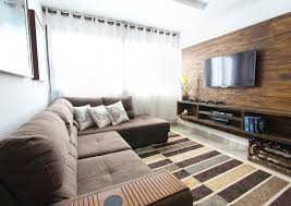 This garage conversion blends a home office and a small seating area complete with a couch for guests. Make Your Garage The Perfect Entertaining Space Findley Roofing