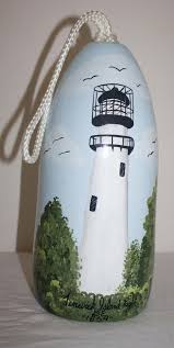 A step by step guide to build your own garden lighthouse out of pallets, a few bits of reclaimed wood, an old garden shed perspex window and a few lollipop. 78 Diy Lighthouse Ideas Lighthouse Lighthouse Crafts Clay Pot Lighthouse