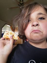 Sad face under squished mosquito.