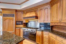 15 stunning kitchens with stained cabinets Painted Vs Stained Cabinets