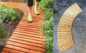How about some wood pathways that naturally blends into your yard? These Roll Out Wooden Walkways Set Up In Seconds For A Beautiful Backyard Path Backyard Walkway Backyard Path Wooden Walkway