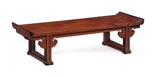 They usually open on wooden slides and can seat more than twenty people when fully extended. A Huanghuali Trestle Leg Table Stand