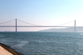 The ponte 25 de abril bridge is located in portugal capital city, lisbon. Ponte 25 De Abril Lissabon Portugal Travel On Toast