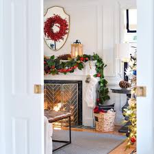 If you select one small enough and strategically arrange the branches or the décor around it, it shouldn't be noticeable. 7 Ways Of How To Hang Wreaths On Windows Rambling Renovators
