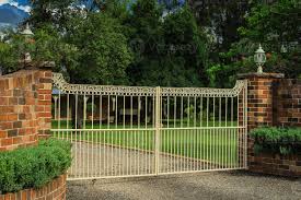 Red metal driveway entrance gates set in modern new house. Metal Driveway Entrance Gates Set In Brick Fence 1245962 Stock Photo At Vecteezy