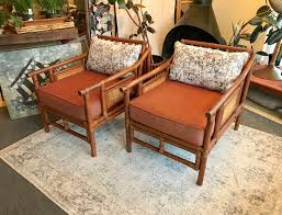 Vintage wear that includes missing or unraveling rattan, surface wear with light dings and scratches. Mid Century Rattan Lounge Chair Dunepad