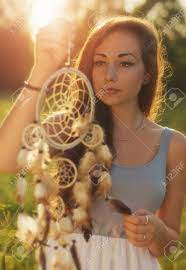A beautiful lady in blue and strange as it may sound to you a. Beautiful Ladies Holding Dream Catcher Stock Photo Picture And Royalty Free Image Image 46207026